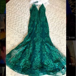 emerald green mermaid style prom dress